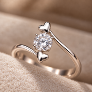 Close-up macro view of 925 silver heart sparkle ring with round stone and polished heart accents