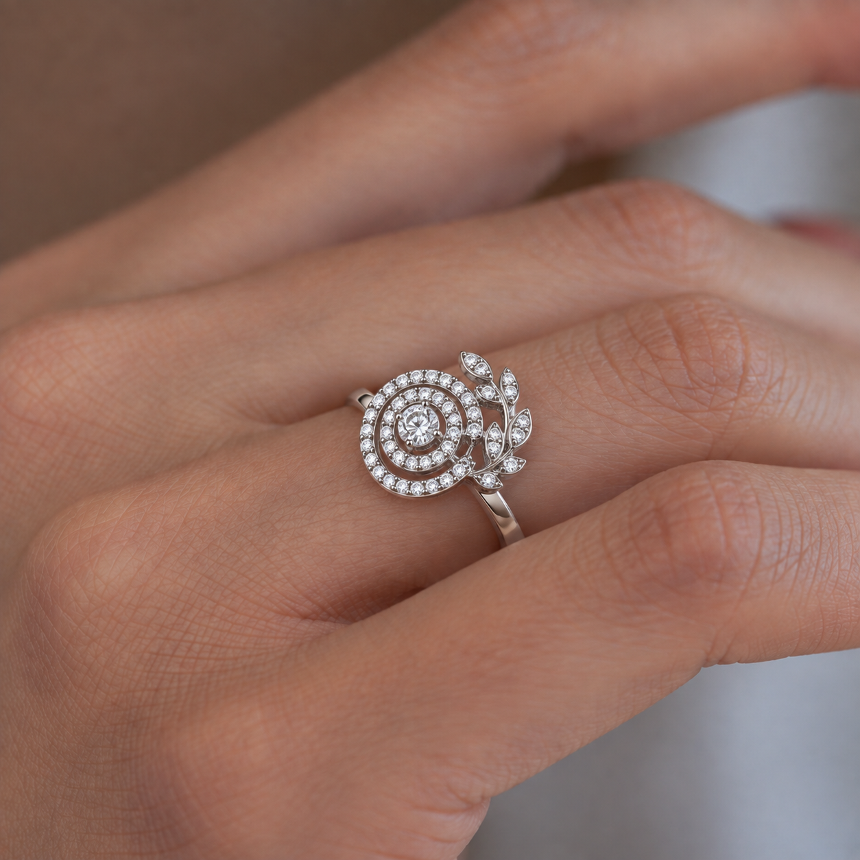 Eternal Leaf Halo Ring worn on a finger showing its halo and leaf detailing