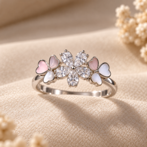 Close-up detail of Blush Petal Heart Ring highlighting its sparkling crystal petal design and delicate blush pink heart-shaped accents.