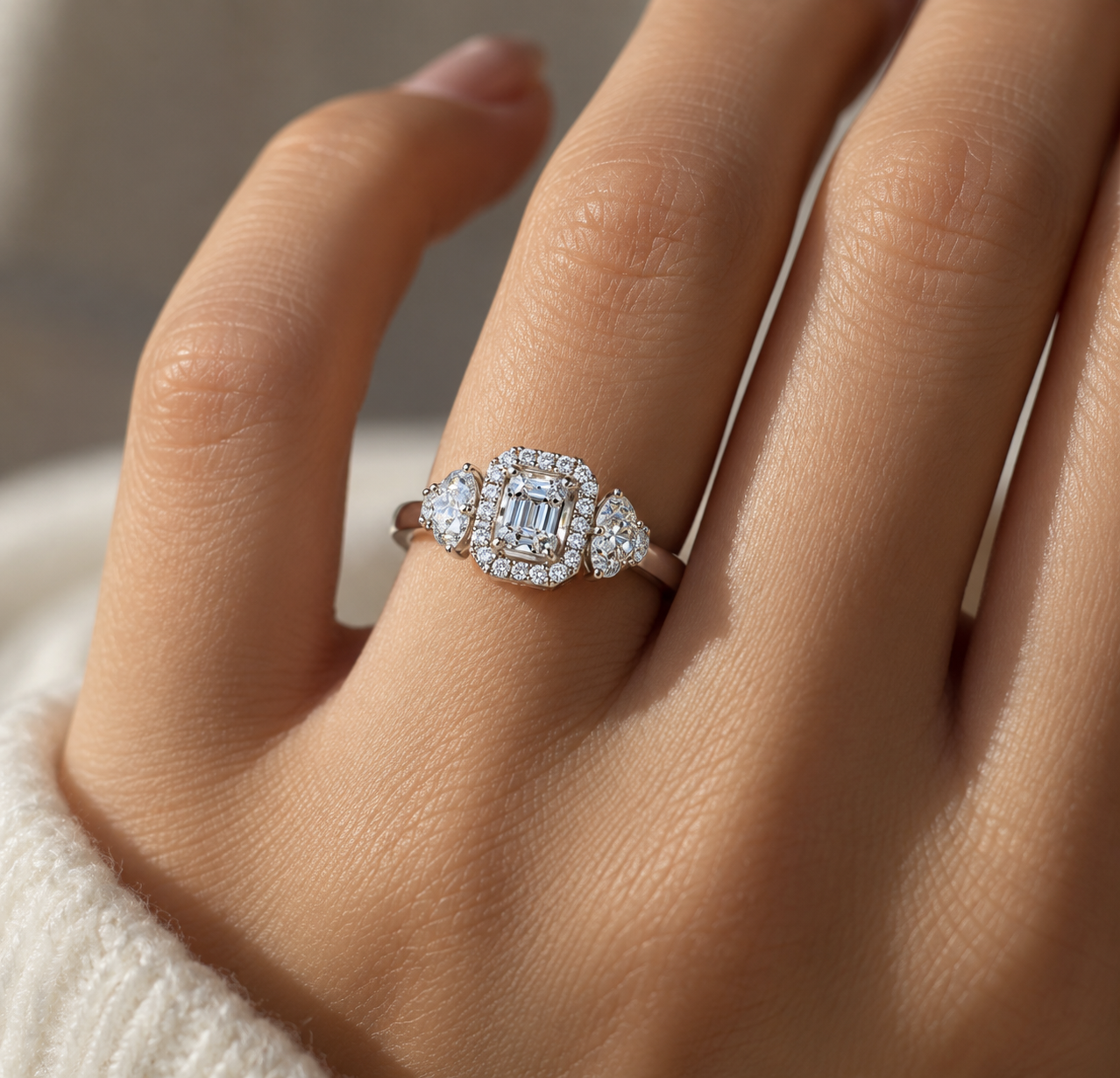 Majestic Halo Ring in 925 silver featuring a sparkling centre stone, diamond halo, and elegant side stones, beautifully worn on the ring finger.